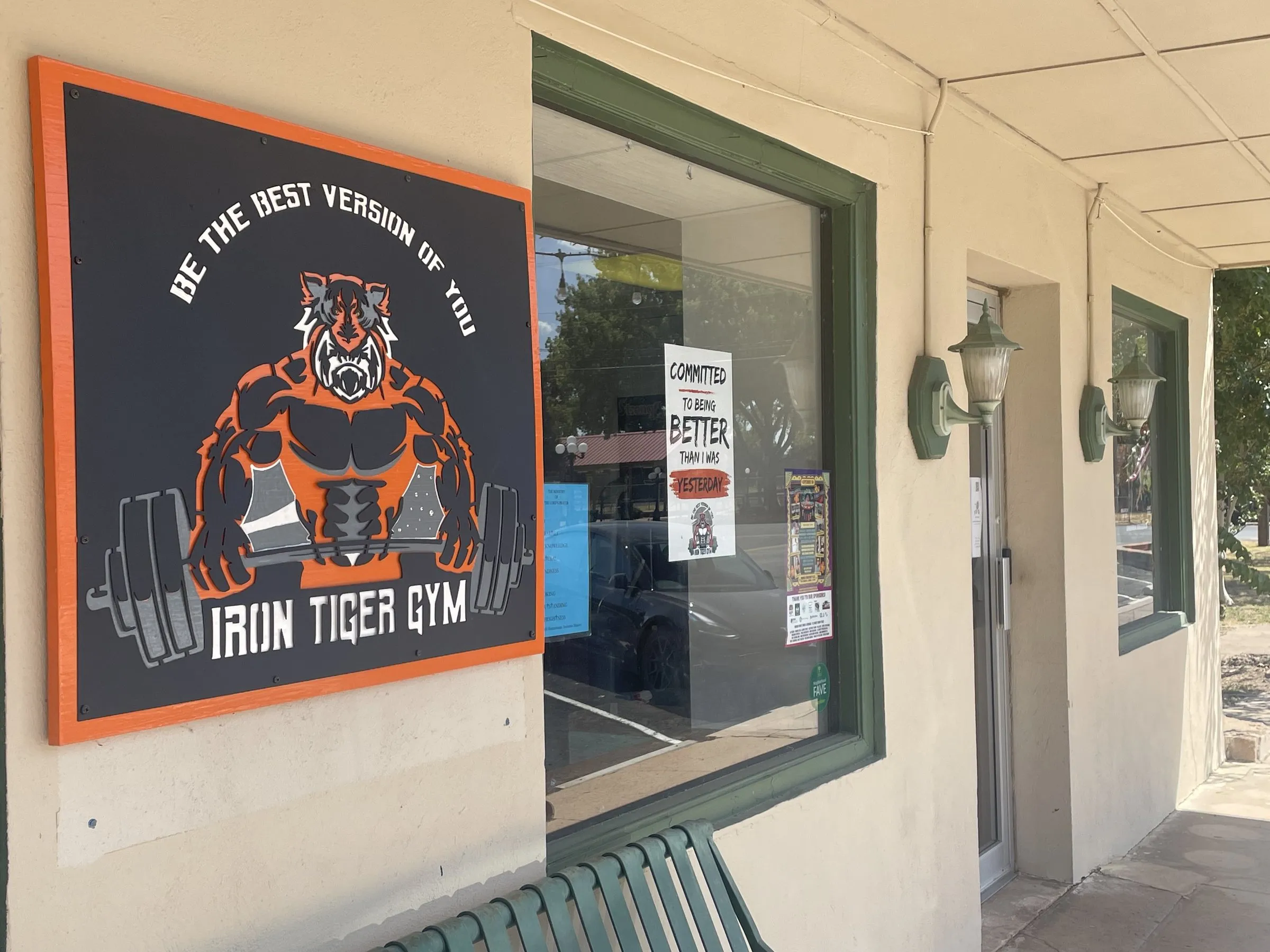 The “Be the best version of you” Iron Tiger Gym sign on the Main Street storefront